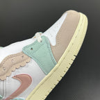 Air Jordan 1 Mid sneaker side view with mint suede panels, beige overlays, and pale yellow sole