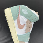 Air Jordan 1 Mid sneaker front-quarter view with mint, white, beige, and pink logo detailing