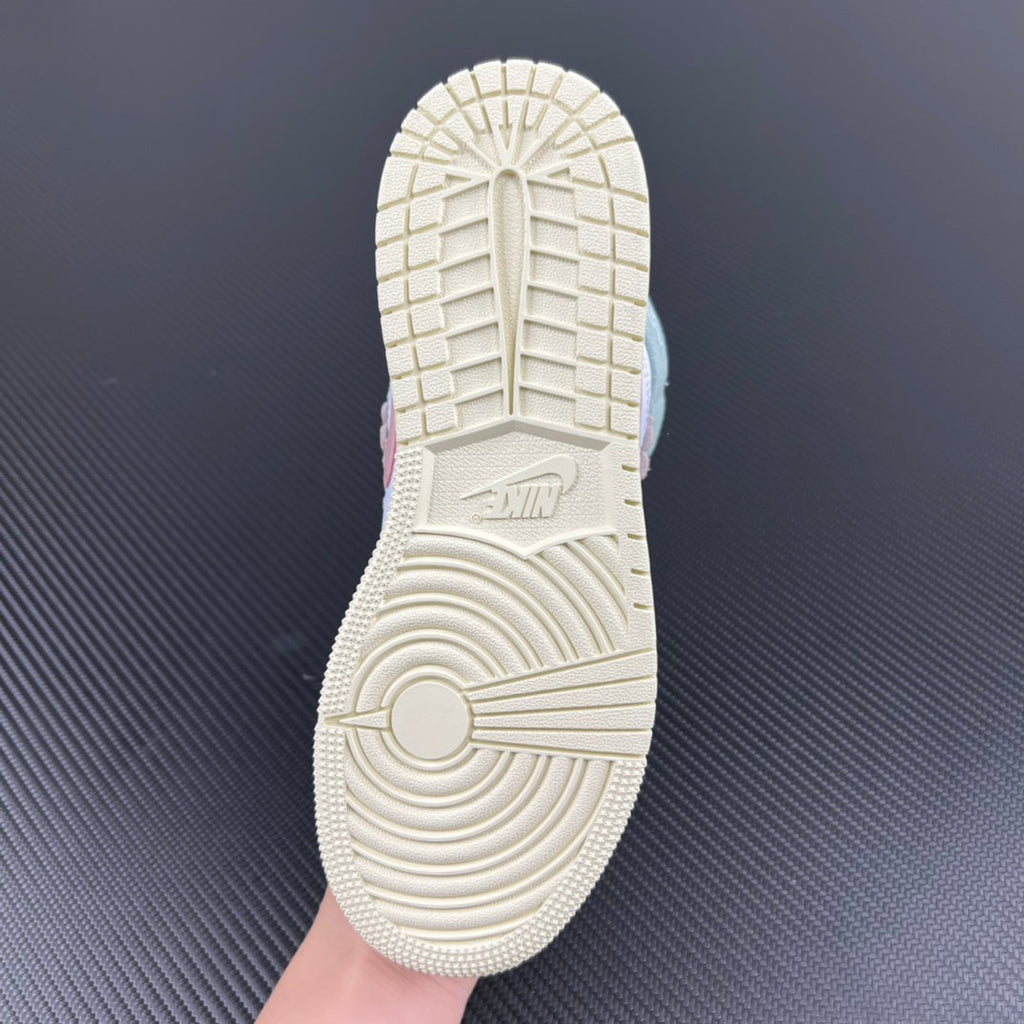 Air Jordan 1 Mid sneaker outsole with off-white traction tread and sidewall texture