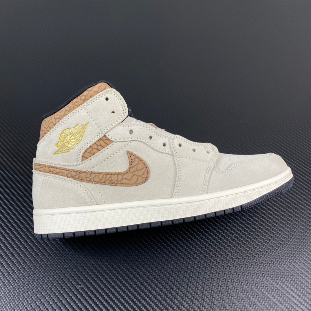 White Air Jordan 1 Mid sneaker with tan swoosh and wing logo