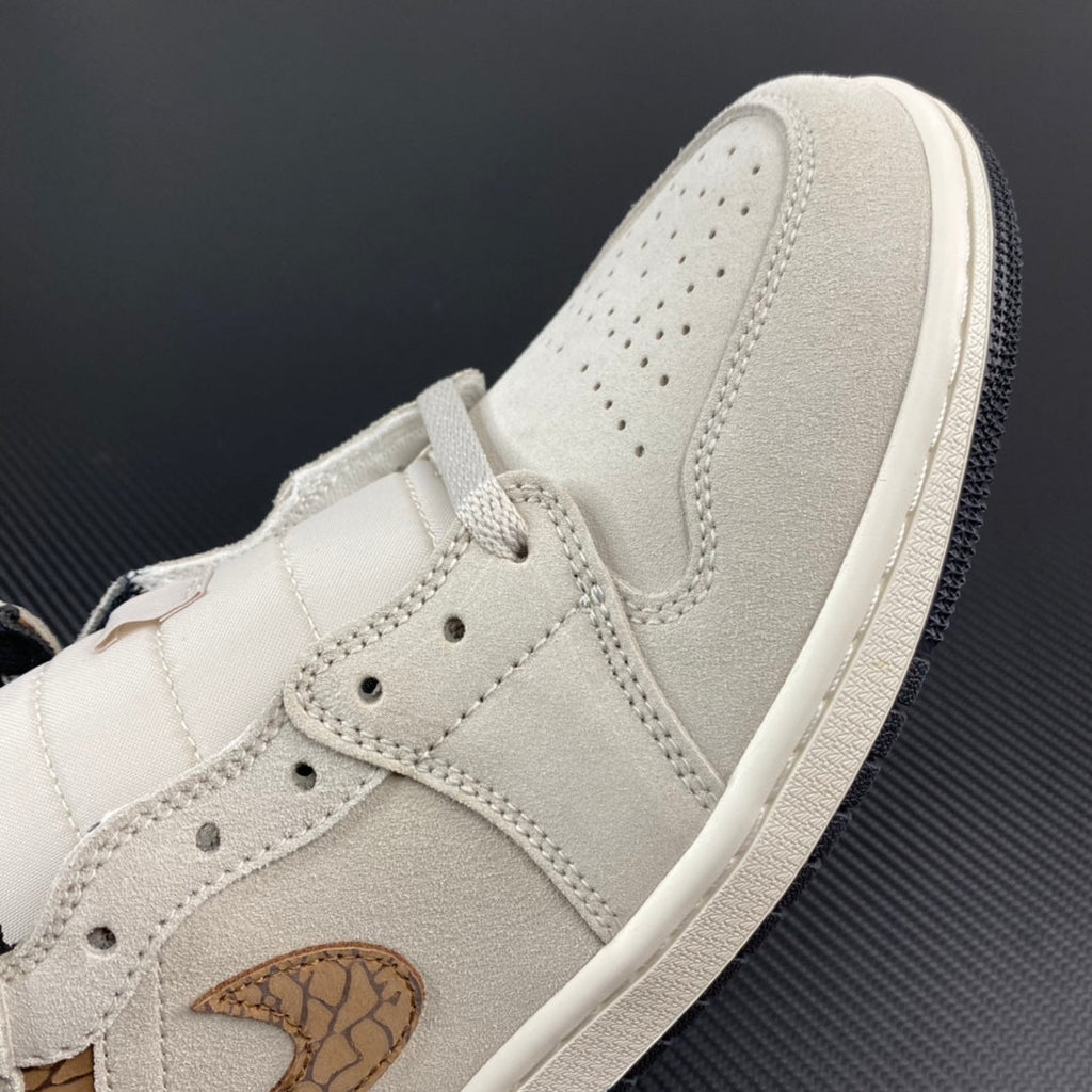 White Air Jordan 1 Mid toe and lace area with tan swoosh detail