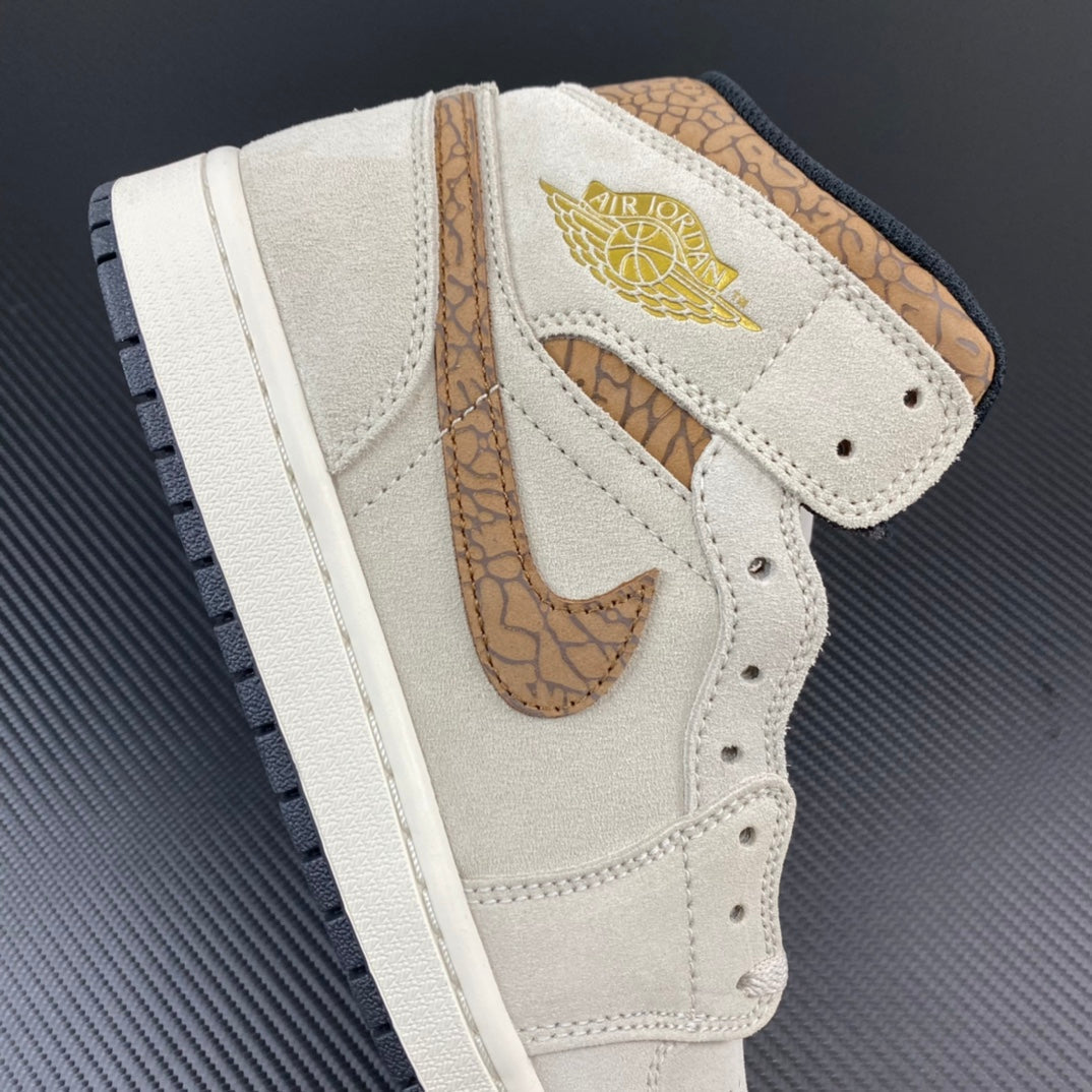 White Air Jordan 1 Mid high-top with tan ankle overlay and gold Air Jordan tag