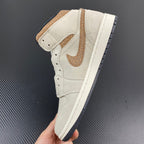 White Air Jordan 1 Mid sneaker with tan collar panel and white rubber sole