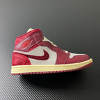 Mid-top sneakers with white panels, burgundy overlays, and red swoosh on beige sole
