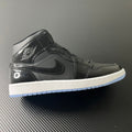 Mid-top sneakers, dark black leather with white midsole and side swoosh