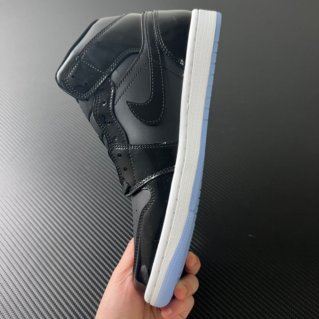 Mid-top sneakers, dark black leather with lace-up front and white outsole