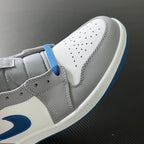 Mid-top sneaker quarter view with white leather panels and blue lace trim