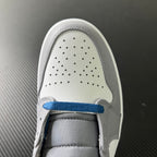 Mid-top sneaker toe box with perforations and blue lace accent