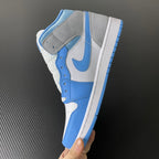 Mid-top sneakers side view with white leather, light blue overlays, and blue-accented sole.