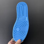 Blue rubber outsole with textured traction pattern for mid-top sneakers.