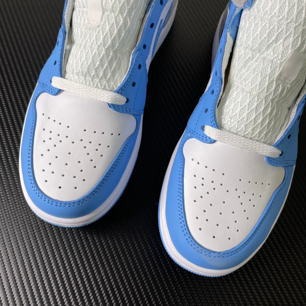 Two mid-top sneakers front view with white uppers, light blue edges, and perforated toe panels.