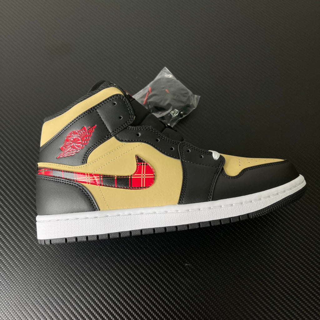 Mid-top sneakers with black and yellow leather, red tartan swoosh detail