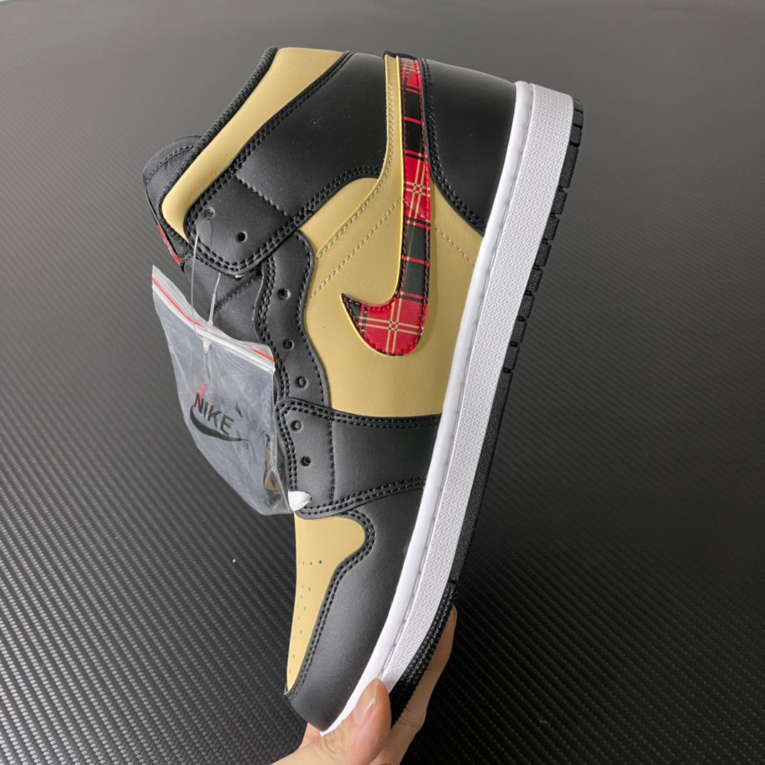 Mid-top sneakers, black and yellow leather with red tartan swoosh on side