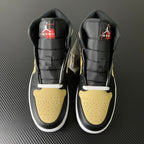 Pair of mid-top sneakers, black uppers with yellow toe panels and red tartan accents