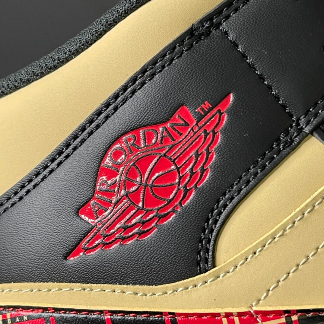 Side logo patch on black leather mid-top sneaker with red basketball wing emblem