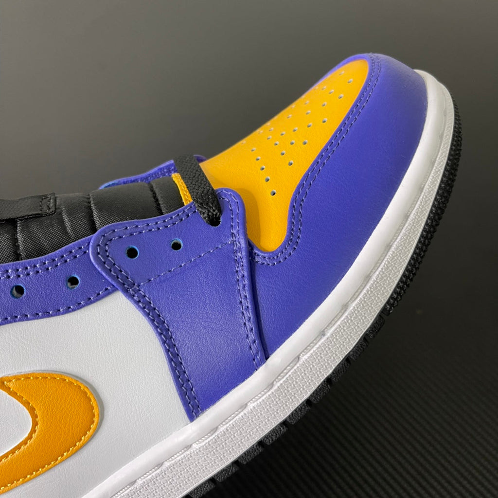 Mid-top sneakers, purple leather with yellow panel, white overlay, lace area close-up