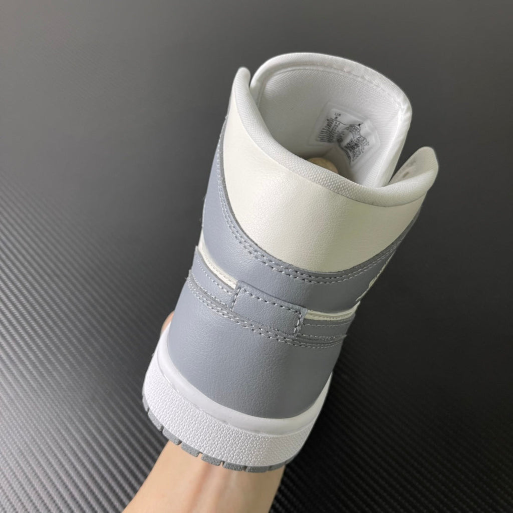 Air Jordan 1 Mid sneaker heel with sail collar padding and light grey side panel