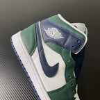Mid-top sneakers side view with green collar, navy strap, and Air Jordan logo patch