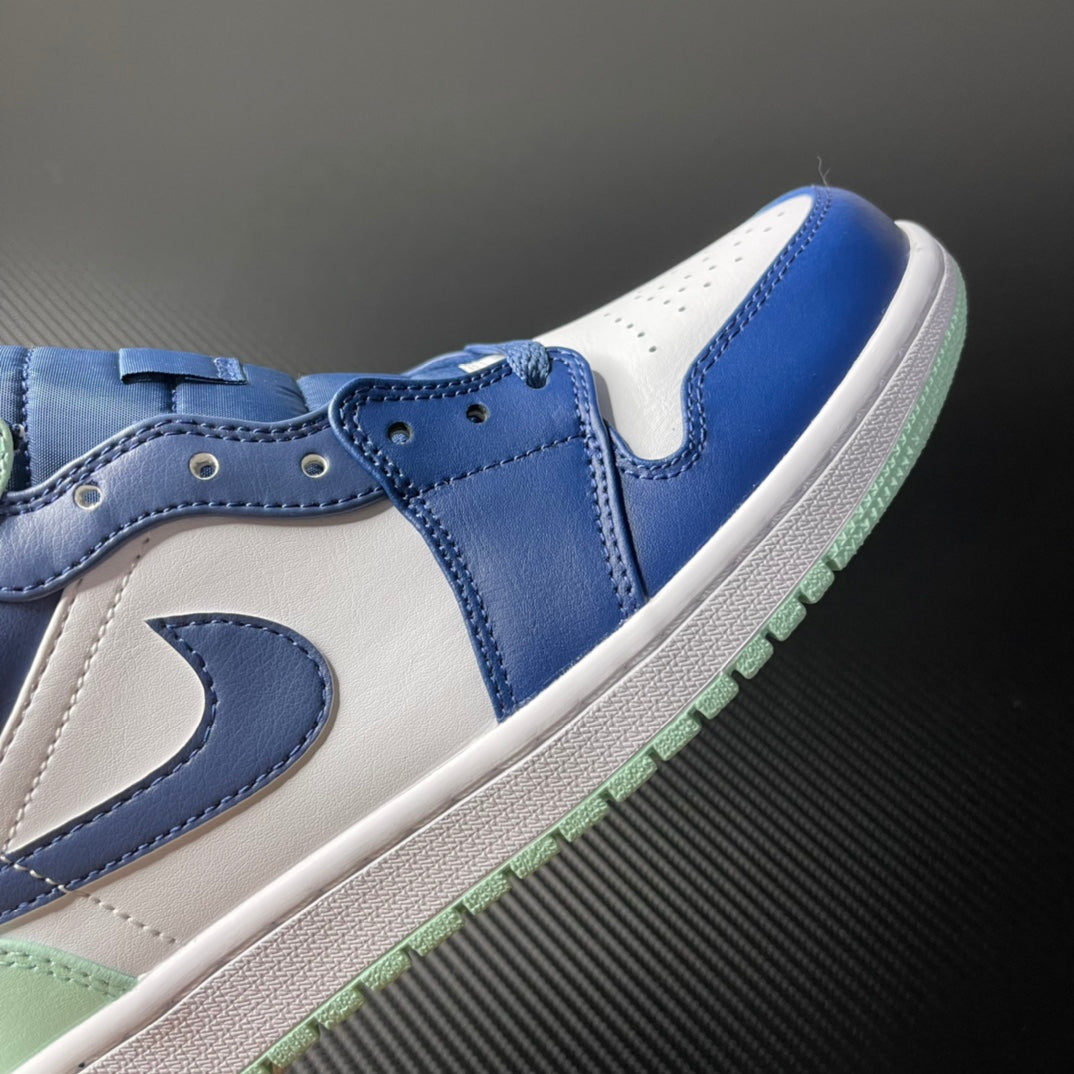 Side view mid-top sneakers in blue and white with mint outsole trim