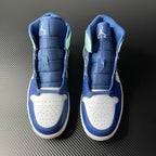 Pair of mid-top sneakers with white toe box and blue uppers, mint accents
