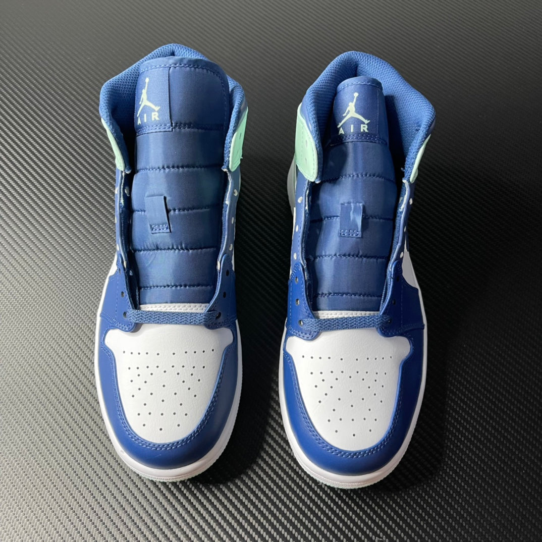 Pair of mid-top sneakers with white toe box and blue uppers, mint accents