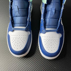 Back view of mid-top sneakers with blue heel collar and white perforated toe