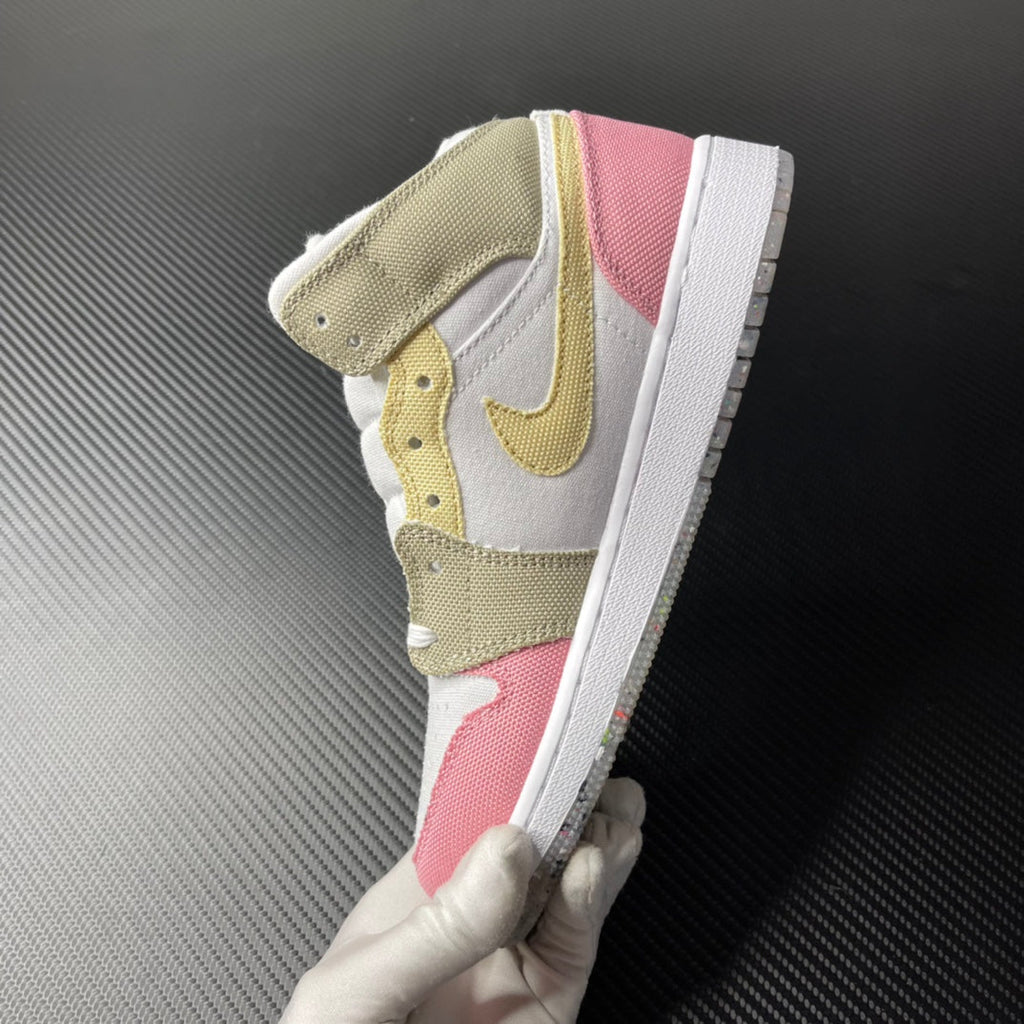Air Jordan 1 Mid sneaker top view on one shoe with white, pink, and gold overlays