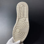 Air Jordan 1 mid outsole tread, textured white rubber with circular grip pattern