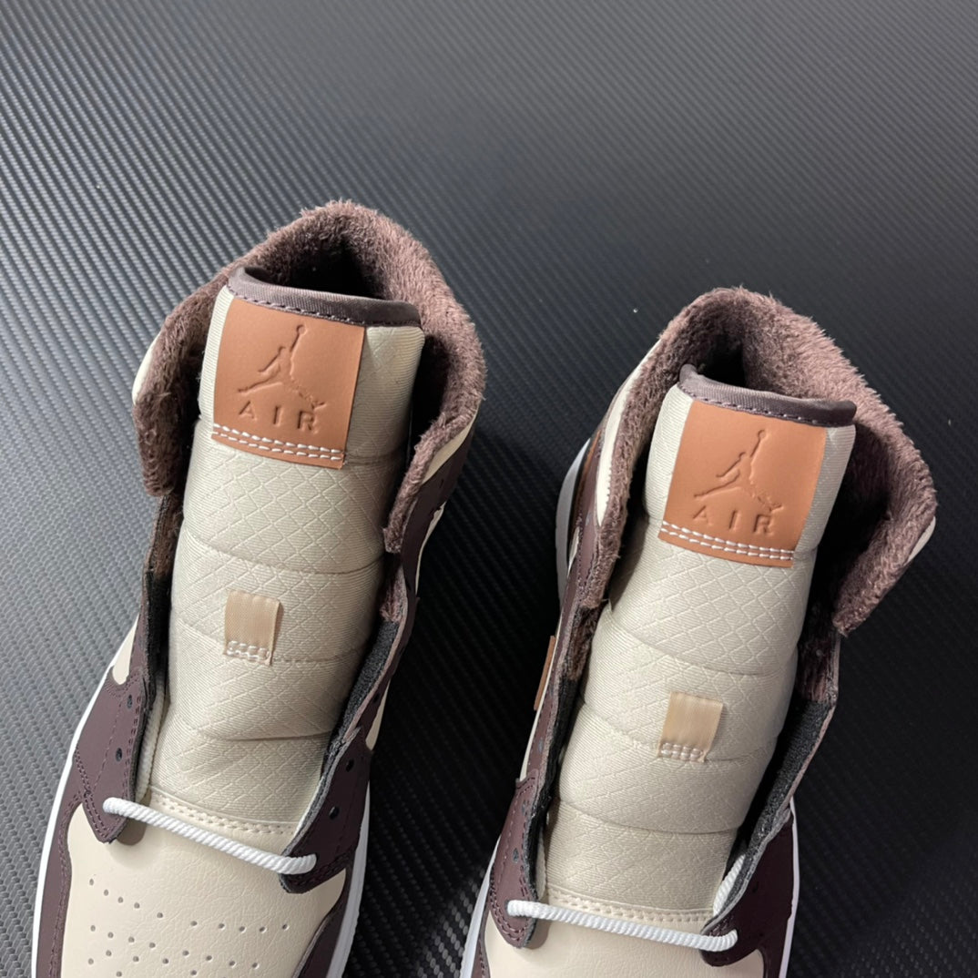 Air Jordan 1 mid-top pair back view, cream lining with dark brown suede collar and Air logo