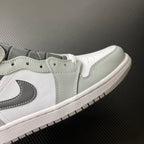 White and light gray mid-top sneaker with black swoosh and lace eyelets