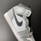 Light gray and white mid-top sneaker with Air Jordan wings heel logo patch