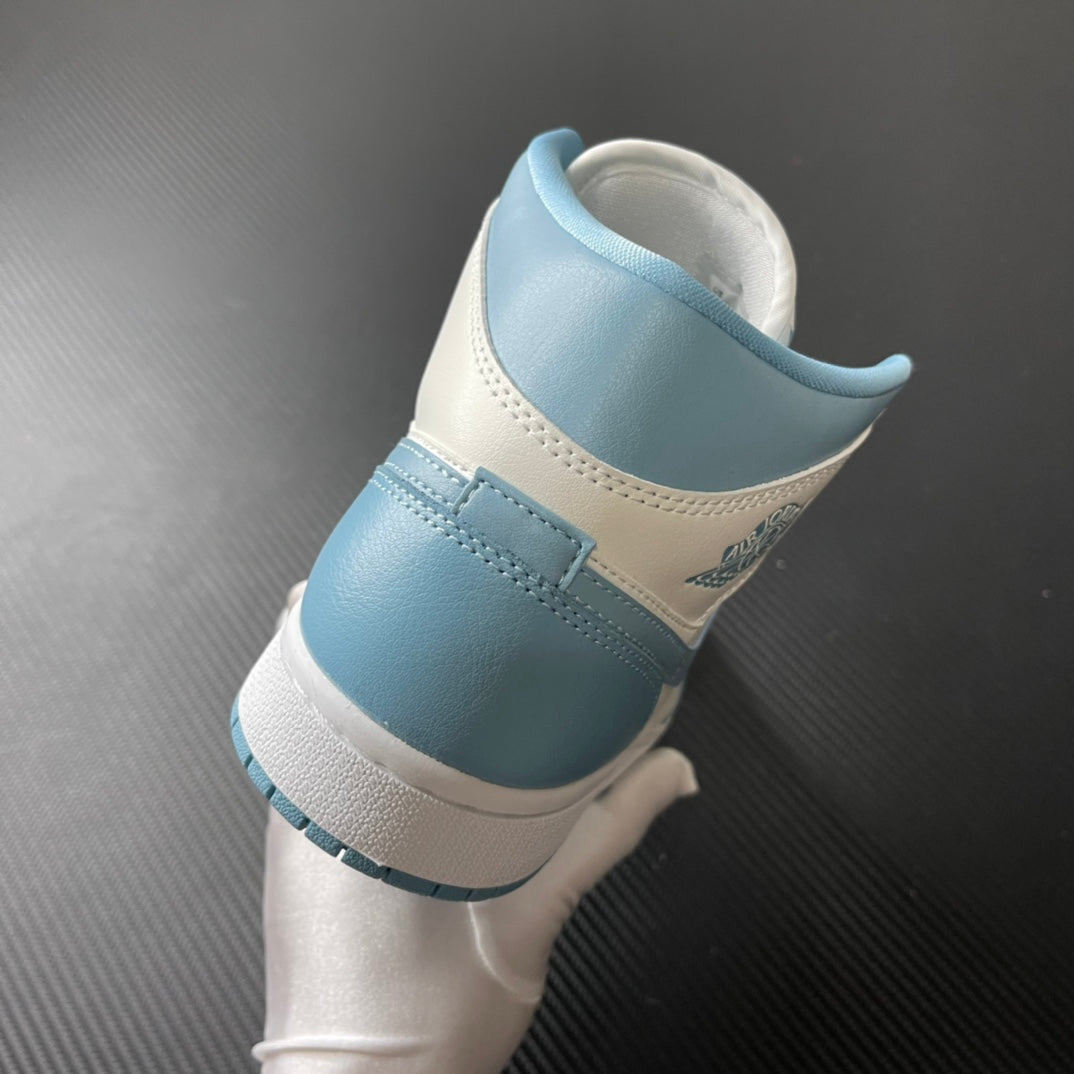 Jordan 1 Mid sneaker heel in light blue and white with stitched collar and ankle padding