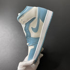 Jordan 1 Mid high-top sneakers in white and light blue, showing side panels and striped outsole