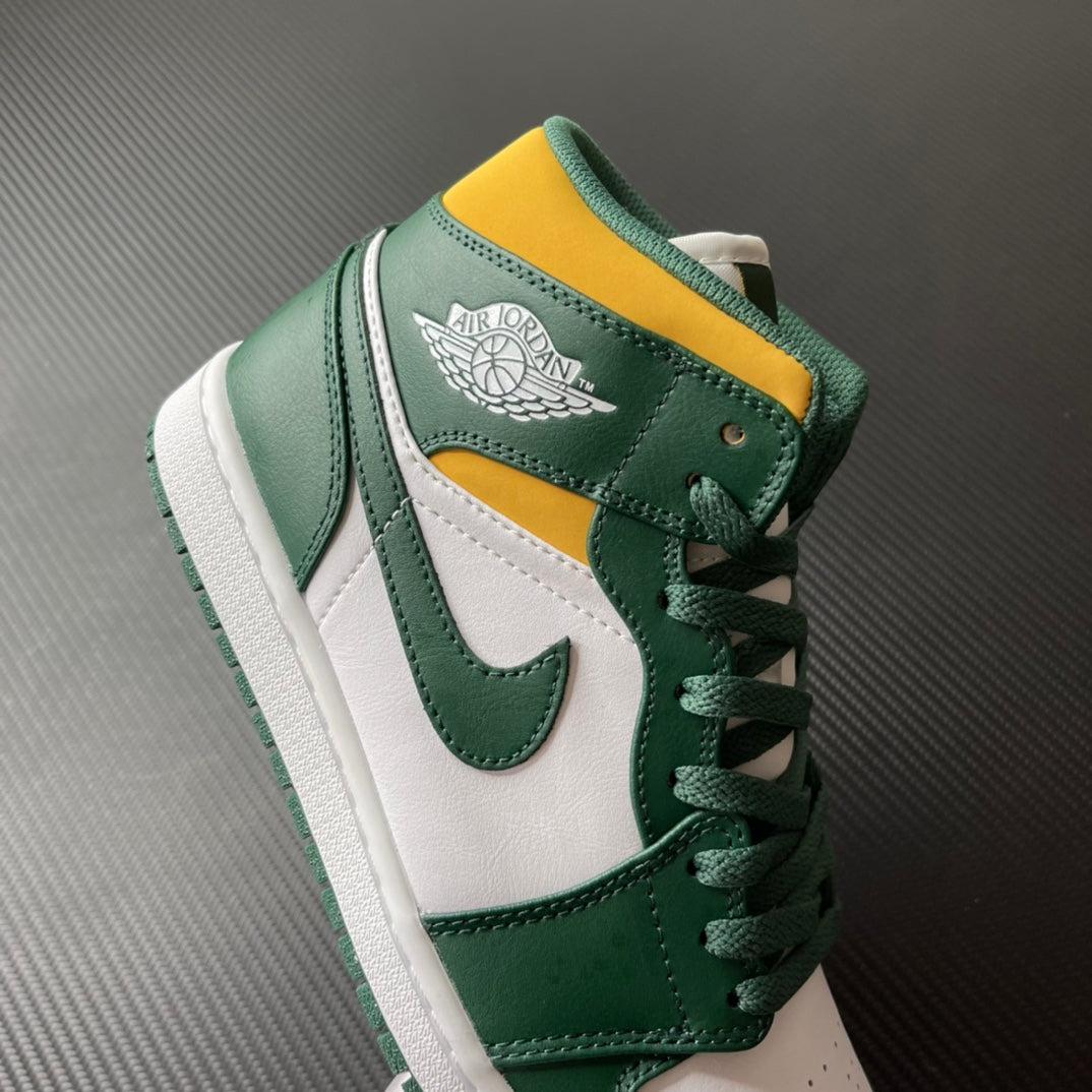 Mid-top sneakers with green leather, white panels, and yellow collar; Air logo patch.