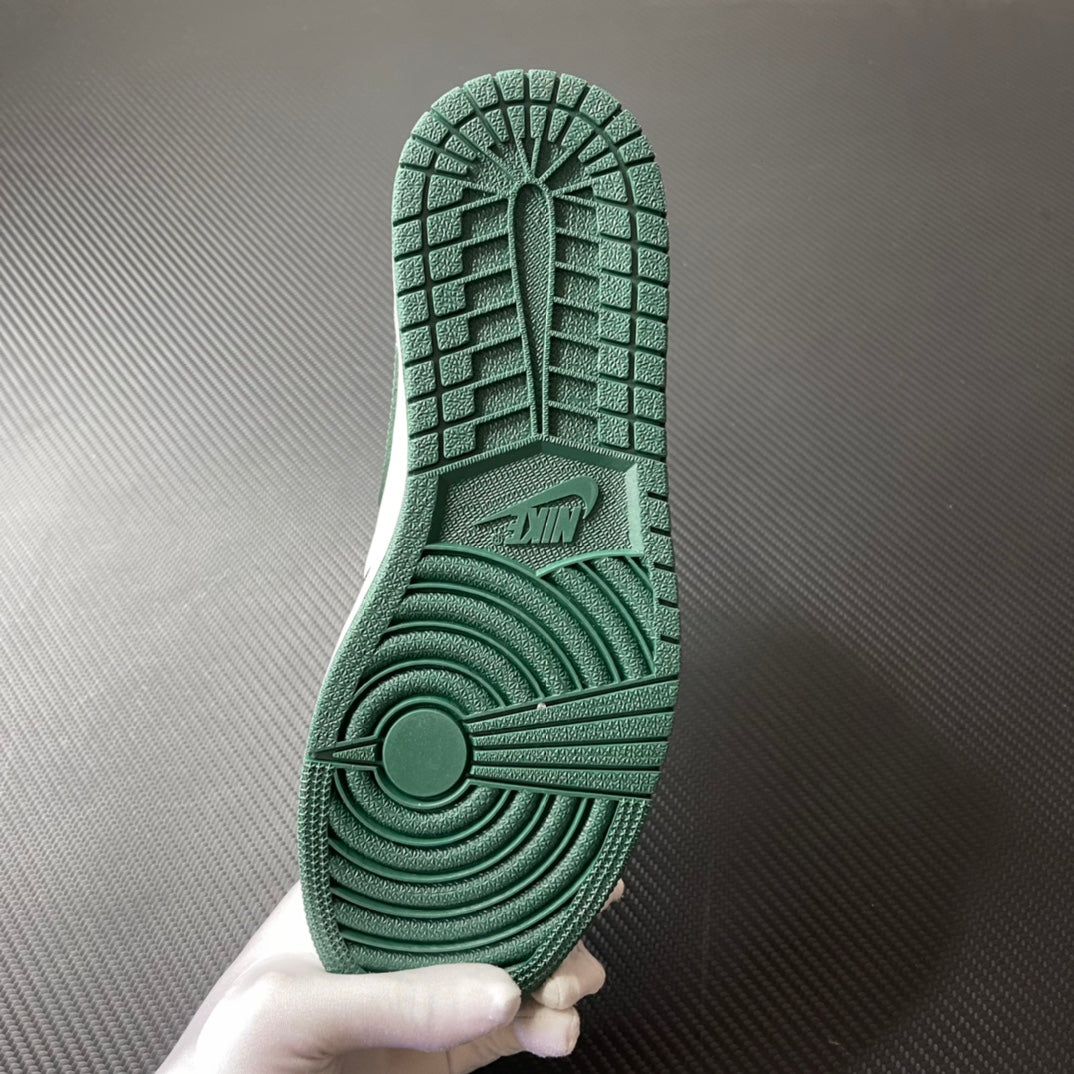 Shoe outsole in green with grippy tread pattern and circular heel traction.