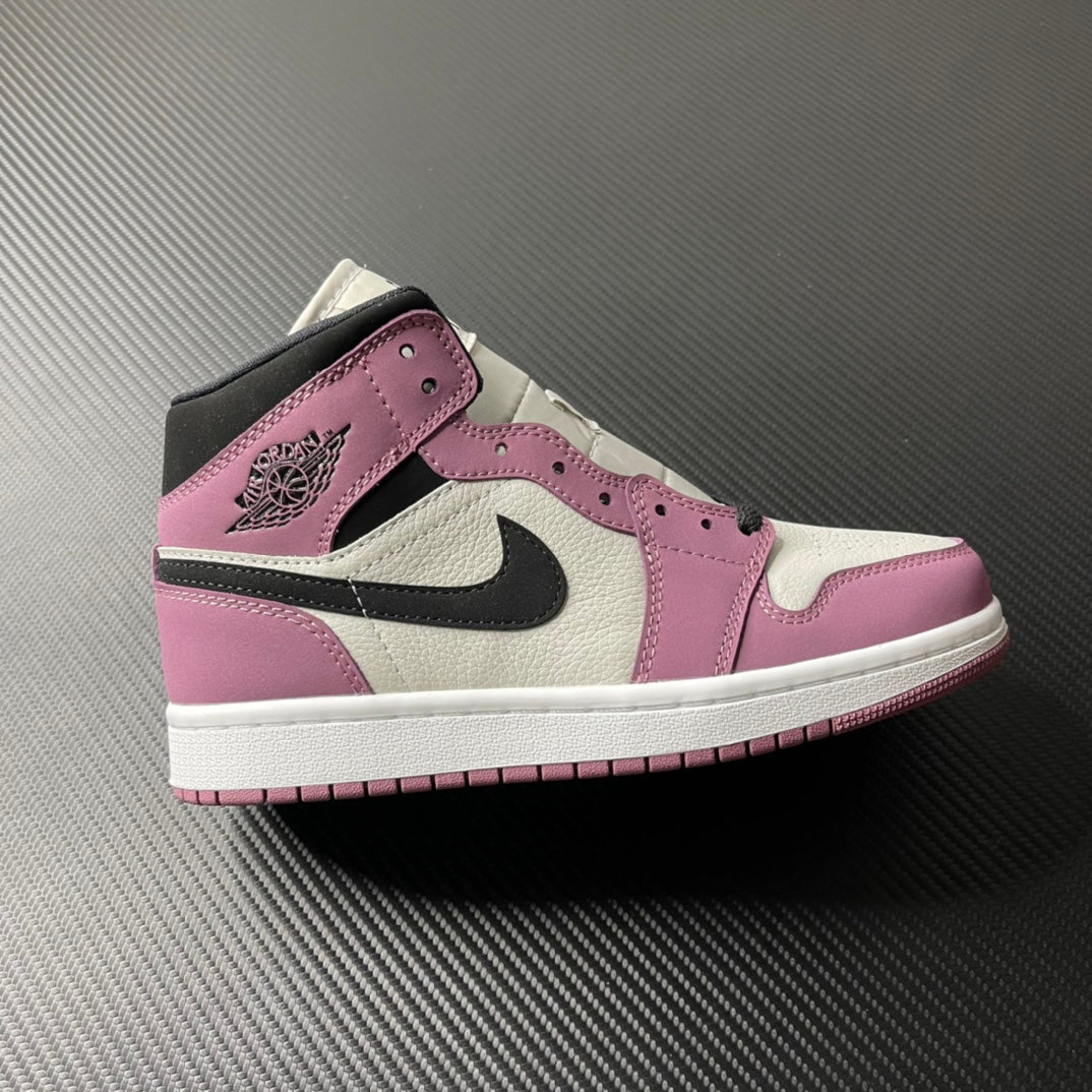 Mid-top sneakers in white, berry pink, and black with Air Jordan wing logo