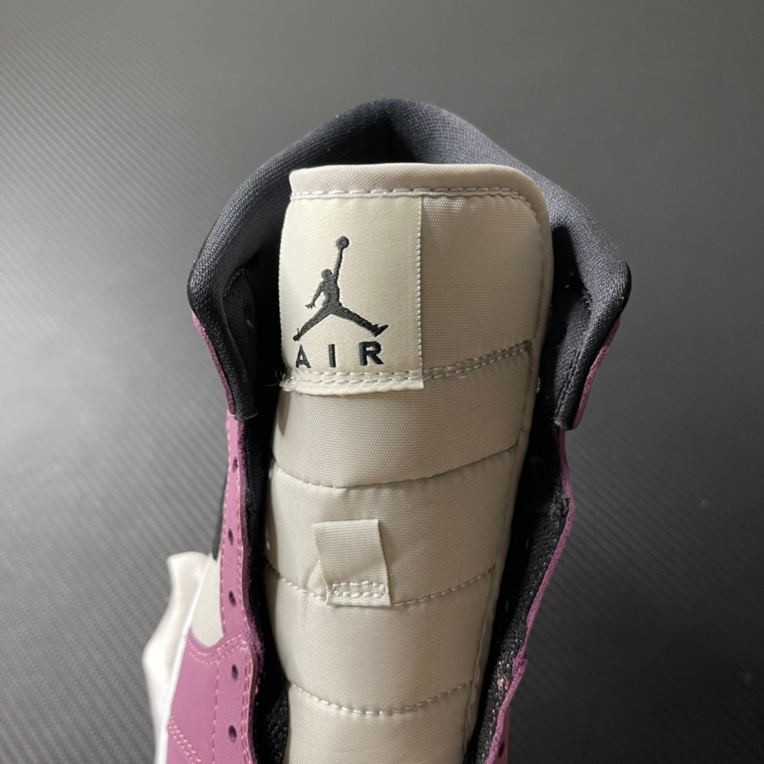Mid-top sneakers back view with Air Jordan Air logo on white heel tab