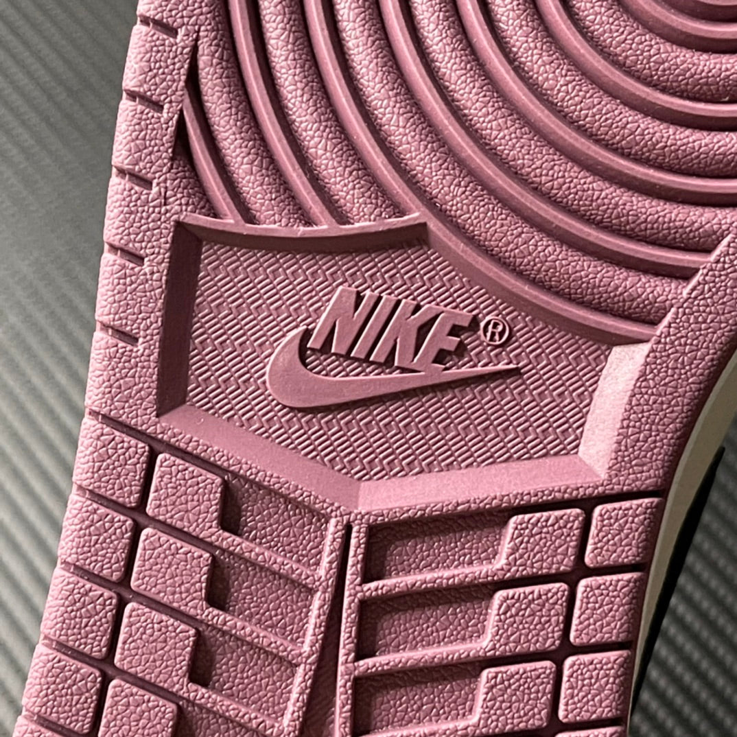 Mid-top sneakers outsole close-up with textured grip and Nike Air logo