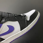 Black and white Air Jordan 1 Mid with purple swoosh, lace eyelets, and perforations
