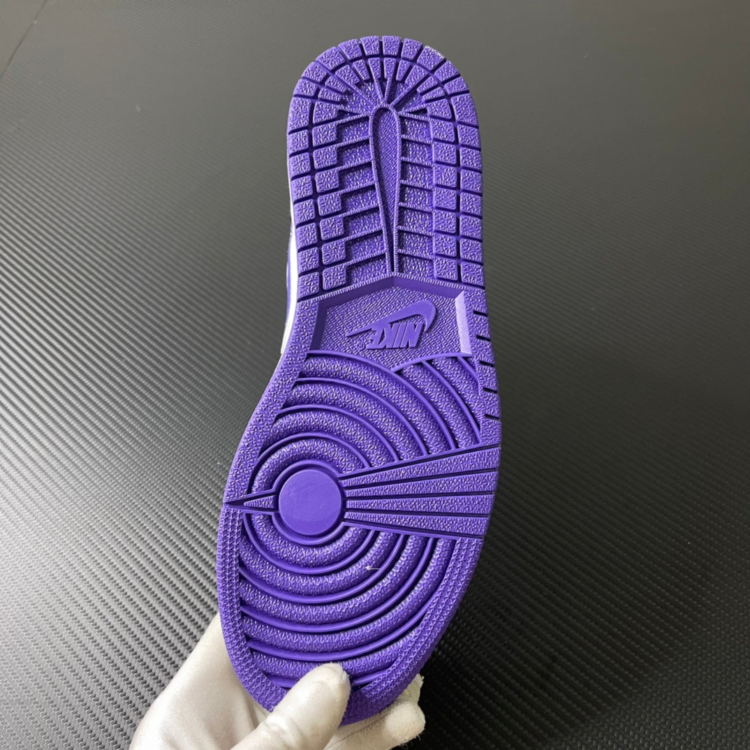Air Jordan 1 Mid purple rubber outsole tread with pivot circle and traction grooves