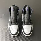 Pair of Air Jordan 1 Mid shoes, black uppers with white toe panels and purple logo