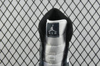 Inside collar view of mid-top sneakers with black lining and Air logo patch