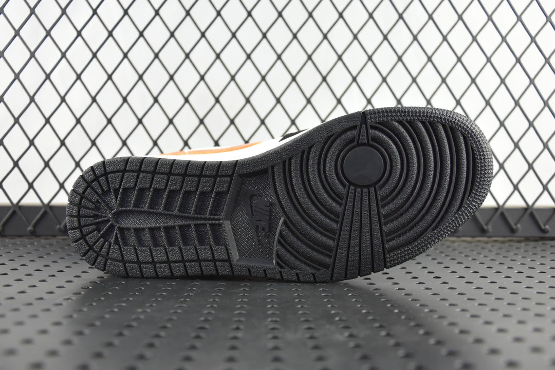 Air Jordan 1 Mid sneakers outsole, textured black tread bottom