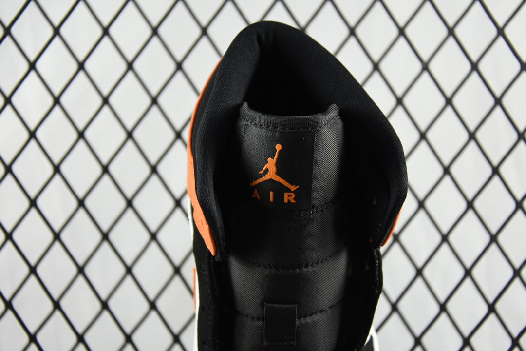 Air Jordan 1 Mid sneaker heel interior view with Air logo on black lining