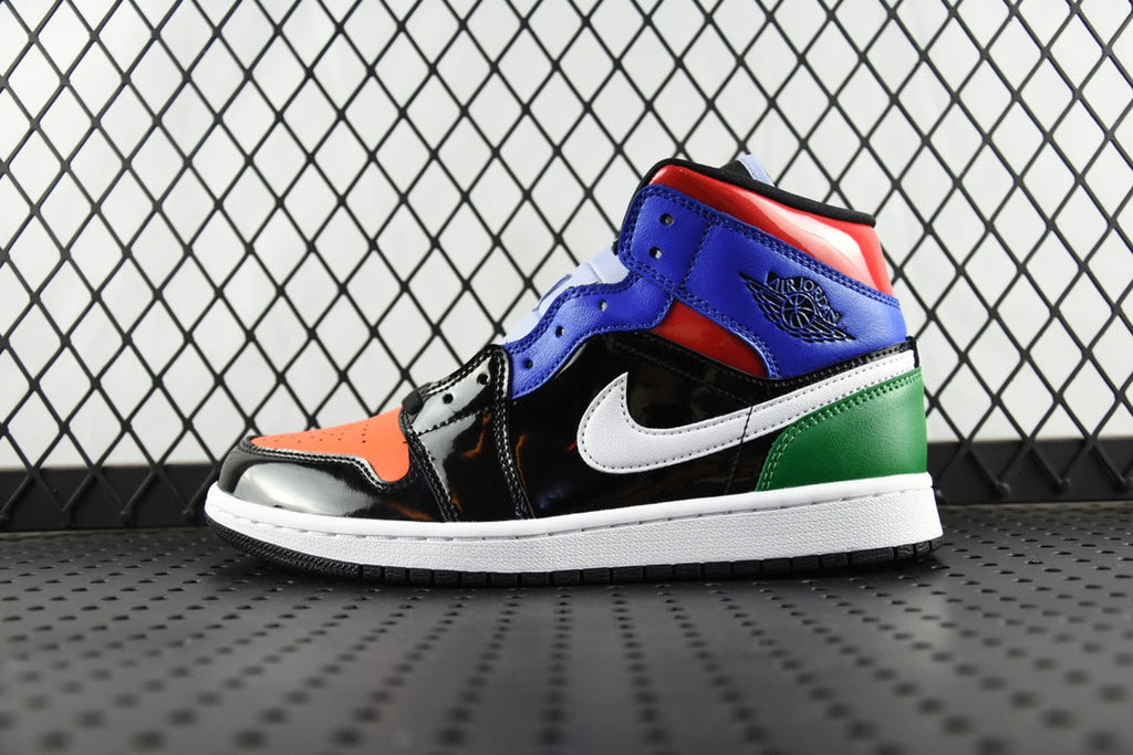 Mid-top sneaker with blue, black, orange, white, and green panels