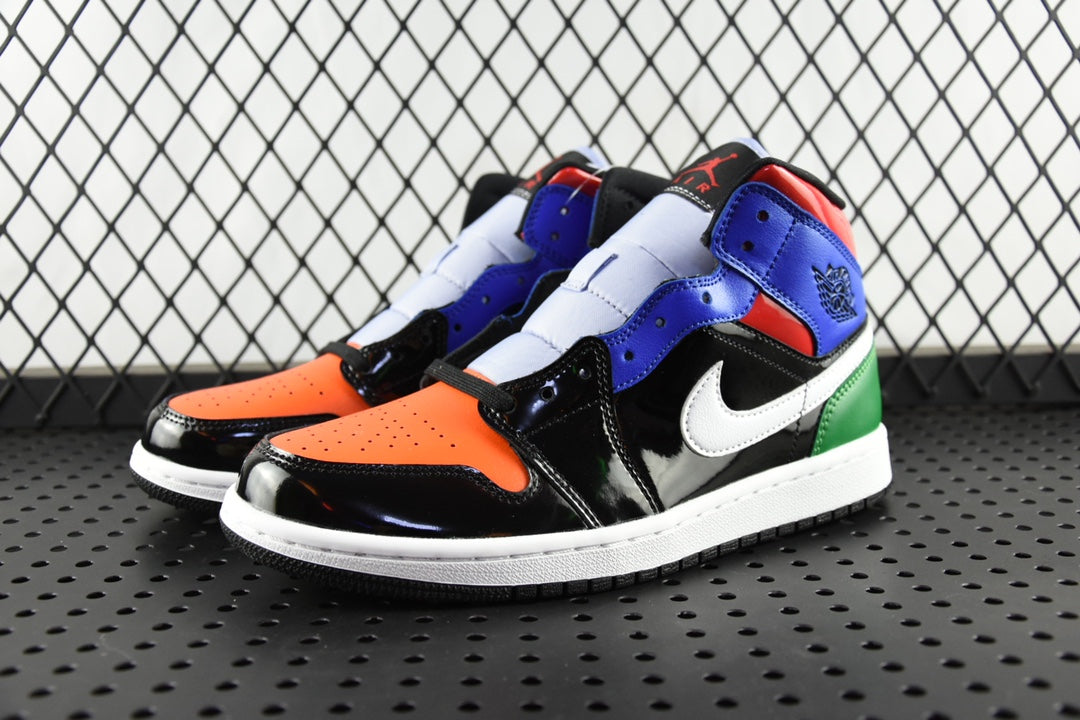 Mid-top sneaker pair with blue, black, orange, white swoosh, and green heel