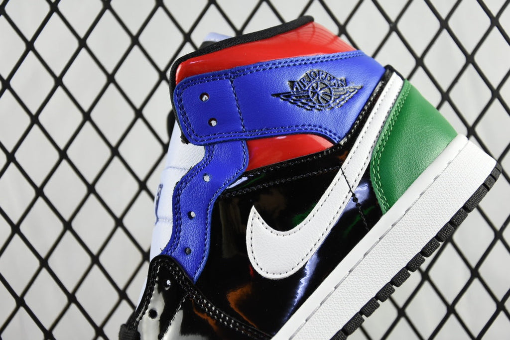 Mid-top sneaker ankle and collar with blue panel, black leather, green stripe, white swoosh