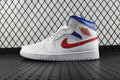 White mid-top sneakers with blue panels, red swoosh, and blue tongue lining.