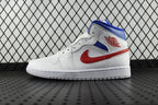 White mid-top sneakers with blue panels, red swoosh, and blue tongue lining.