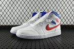 White mid-top sneakers with blue collar, red swoosh, and red accent stitching.